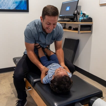 Little boy treated with Chiropractic Care