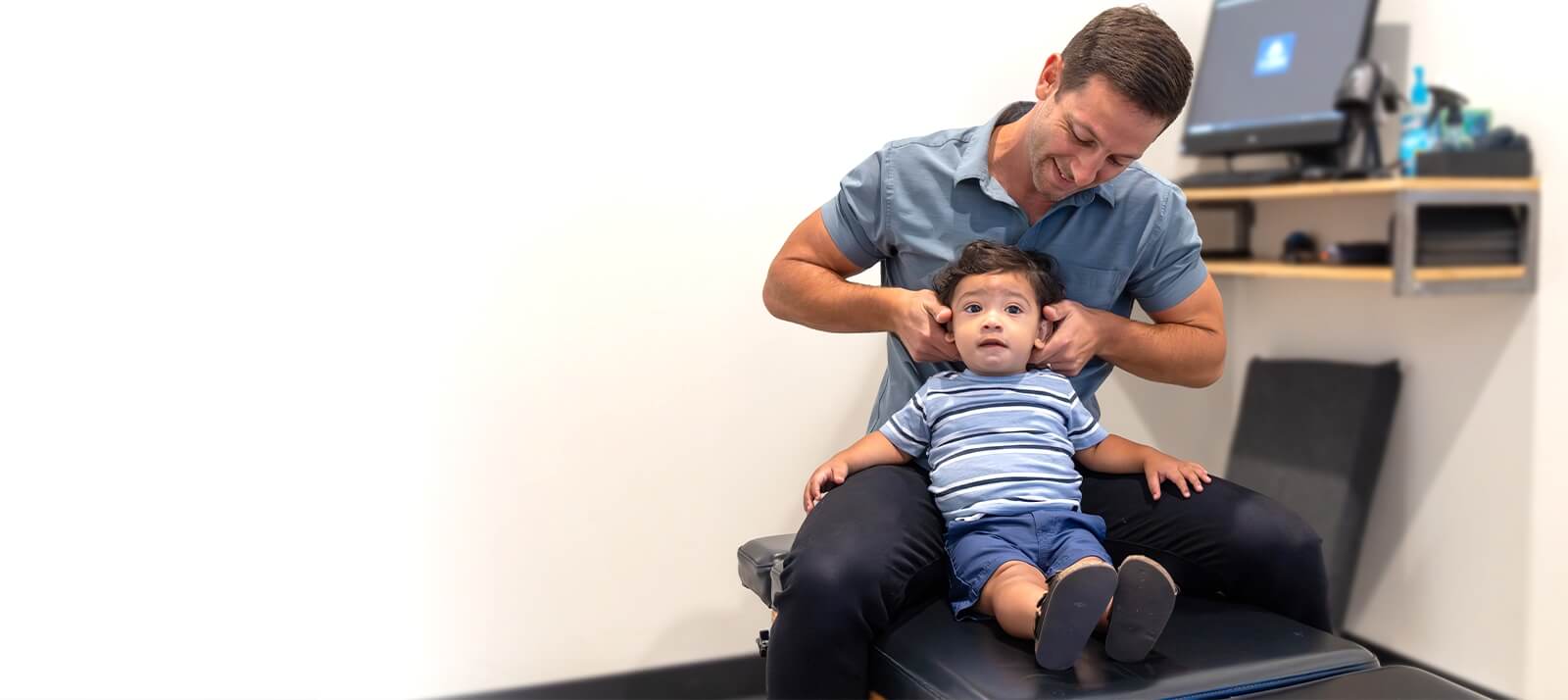San Marcos chiropractor adjusting a pediatric patient