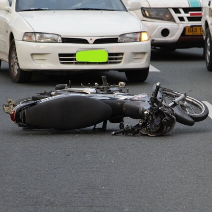 Motorcycle accident on road