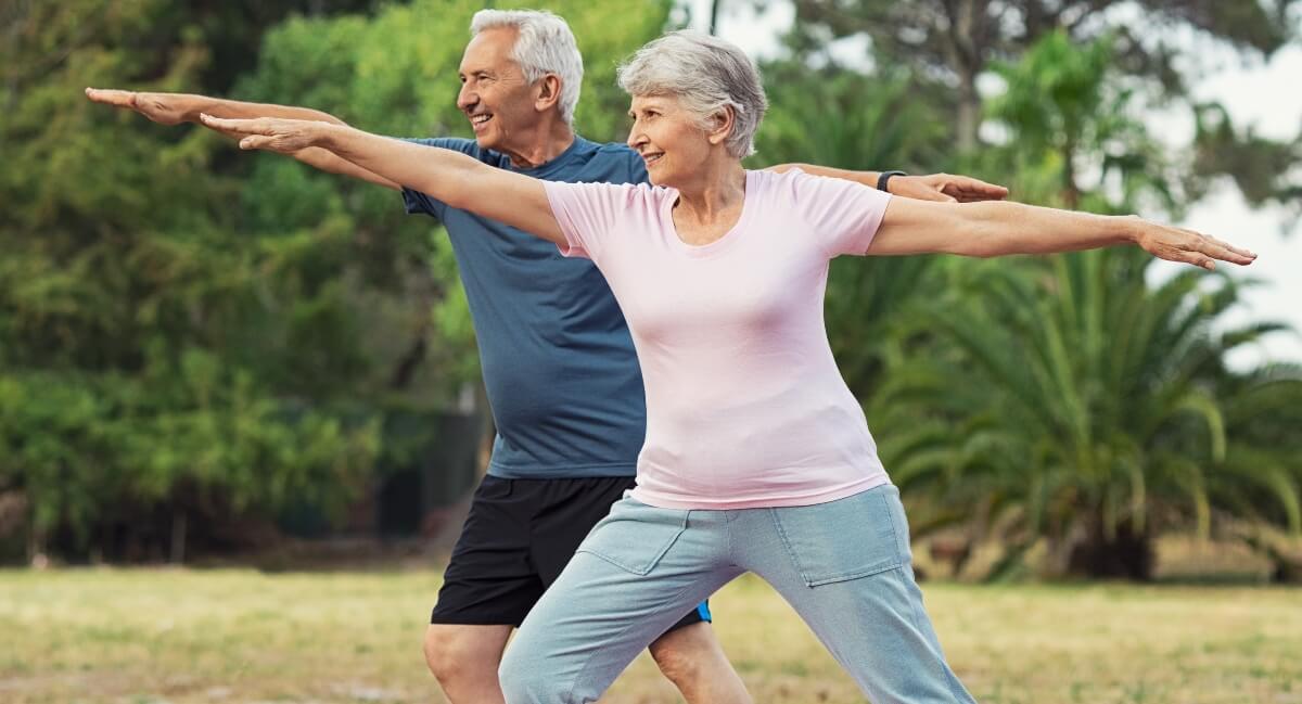 Old people stretching out in nature