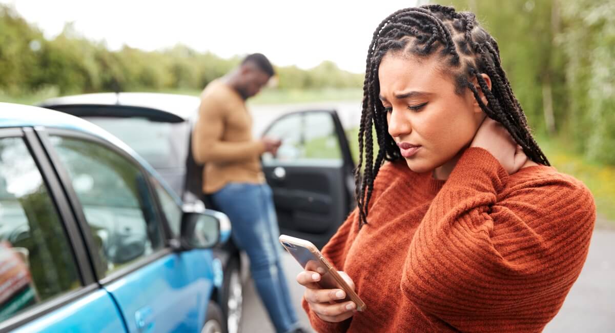 Woman with neck pain after car crash