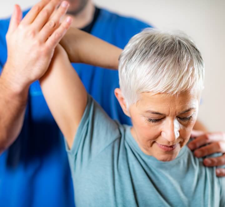 stretching a woman's arm