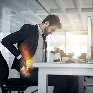 man sitting on chair with spine overlay