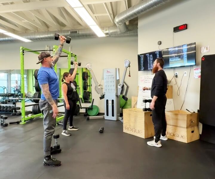 man and woman doing personal training