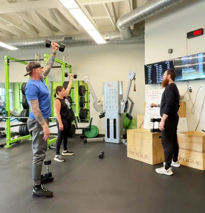 man and woman doing personal training