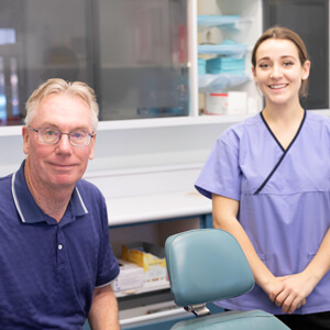 Dr Cadee and dental assistant