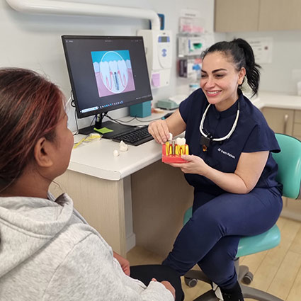 Dr Iram talking with patient