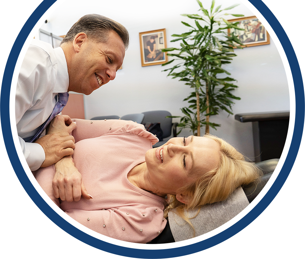 Dr. Kleinberg adjusting patient's back