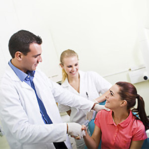dentist greeting patient