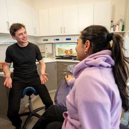 Consulting with patient