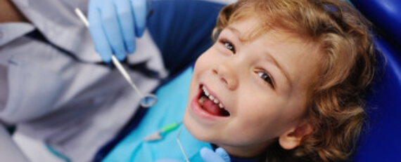 kid in dental chair