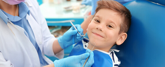child in dental chair