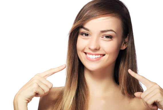 young woman smiling with white teeth