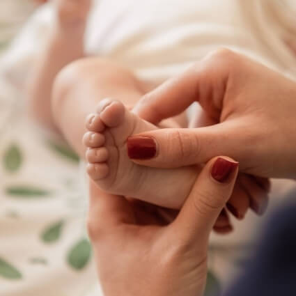 babys foot being examined
