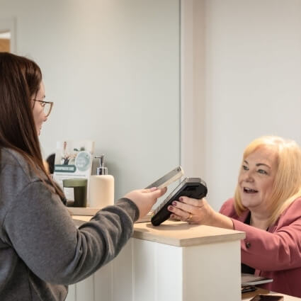 patient checking in at our front desk