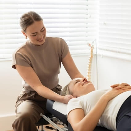 patient having neck adjusted