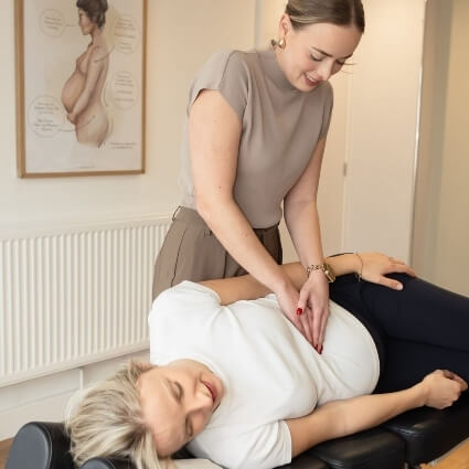 pregnant patient having stomach examined