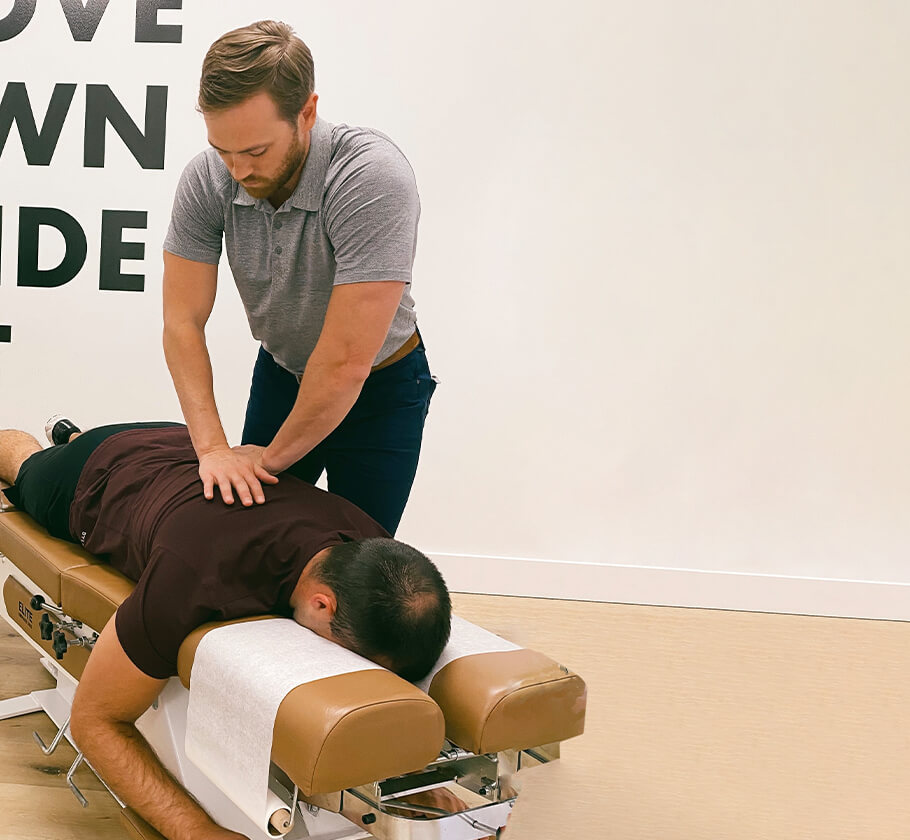Dr Tyler adjusting mans back