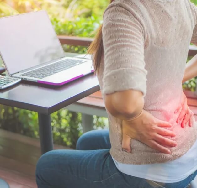 woman with hands on lower back