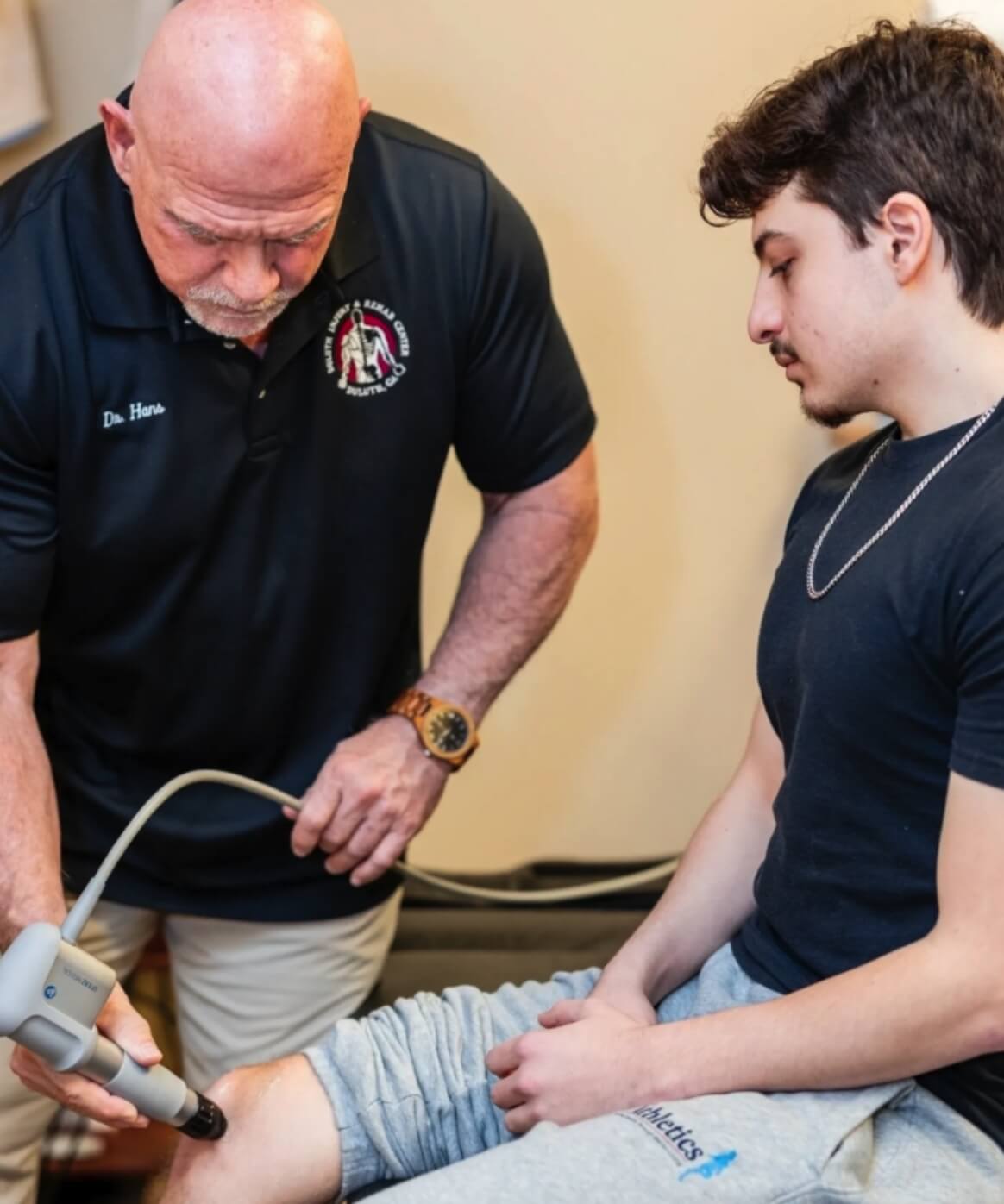 Norcross Chiropractor Dr. Joseph Hans working with patient