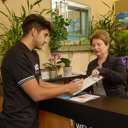 patient completing paperwork