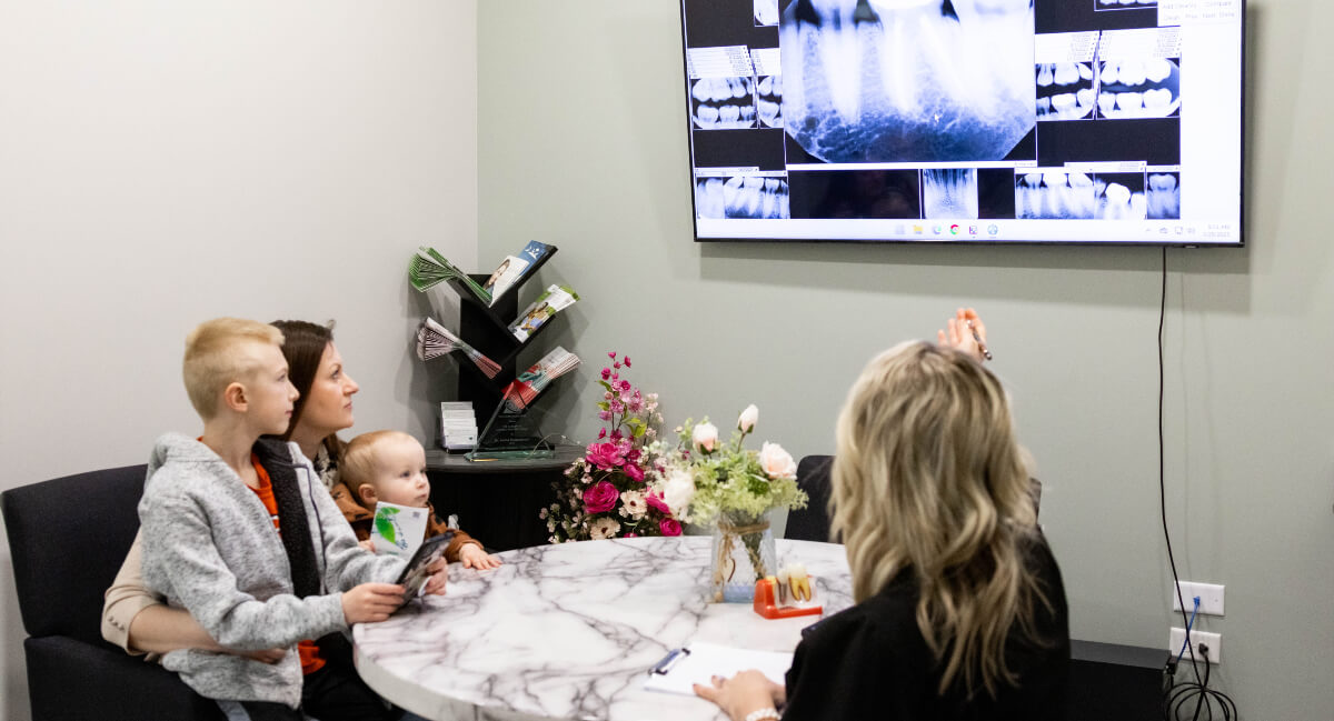 Barrington dentists in consultation with patients