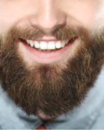 Bearded man smiling