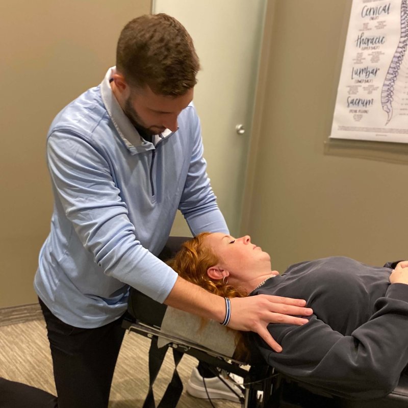 Dr adjusting patients neck