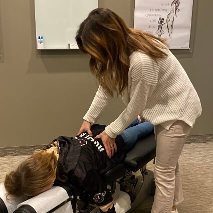 Dr Ashley adjusting kids back