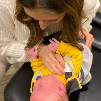 Dr Ashley adjusting baby