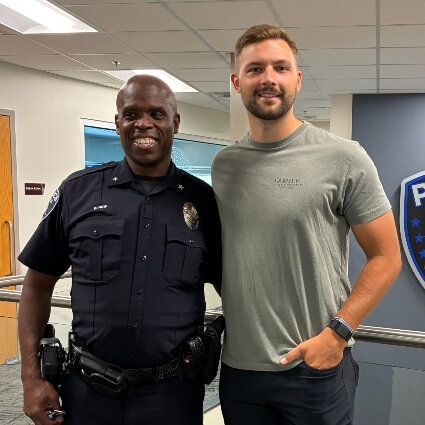 Dr C with a police officer