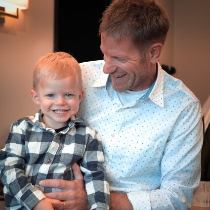 Dr J with a smiling boy