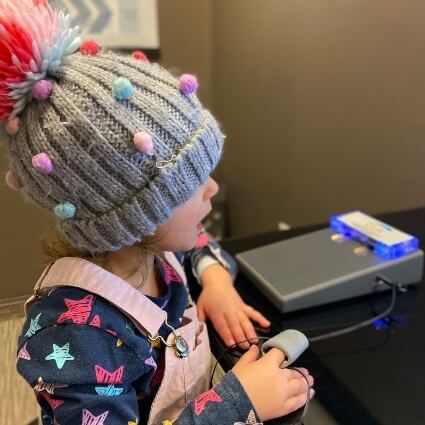 Kid getting hand scan