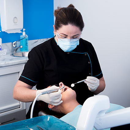 person during dental procedure 