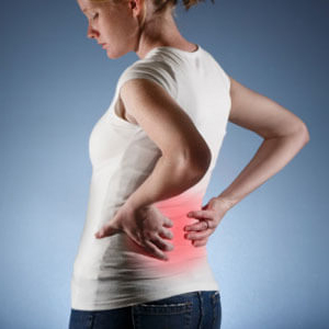 Young woman with lower back pain