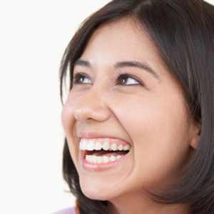 Young woman with dark hair smiling