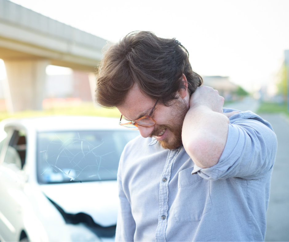 Man holding hurt neck