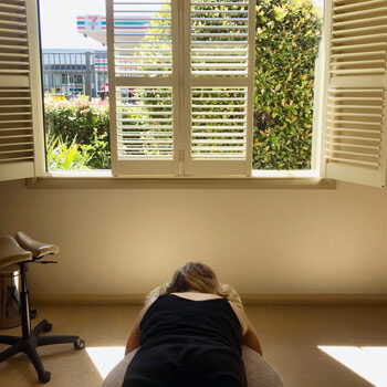 patient laying on adjusting table