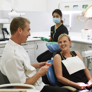 Dr Mendoza consulting with patient