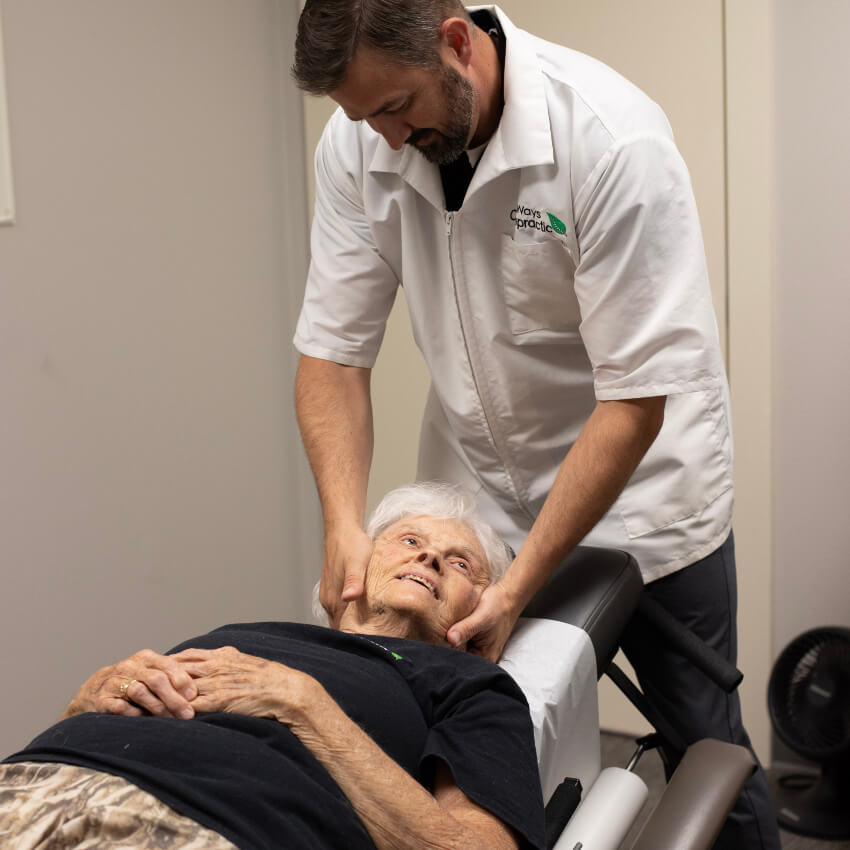 patient having neck adjusted