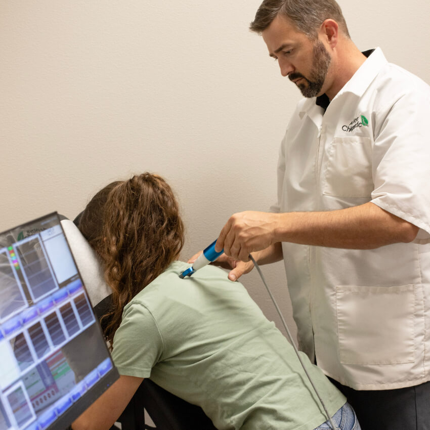 patient having neck adjusted