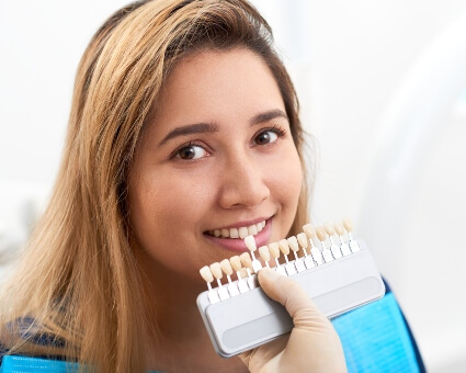 Female patient dental veneers