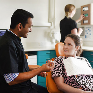 Dr Nik talking with patient