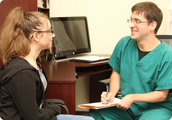 Dr. Hembree consult with patient