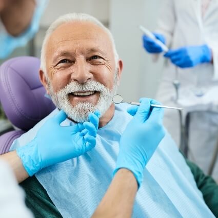 Older man at dental appointment 