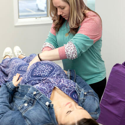 Dr. Lynsi adjusting child