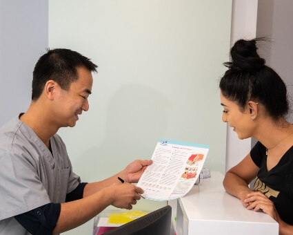 Wallsend dentist Dr. Daniel interacting with patient