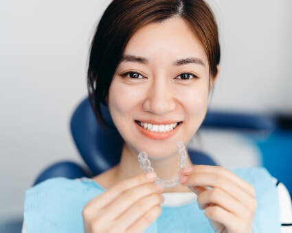 Female dental patient with Invisalign