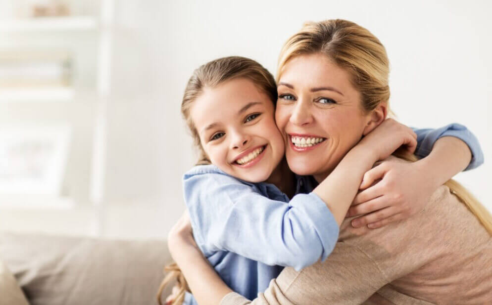 Mom and daughter hugging