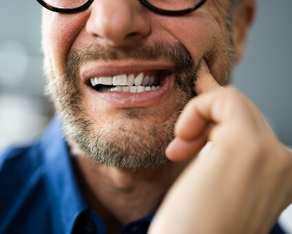 Man with dental emergency